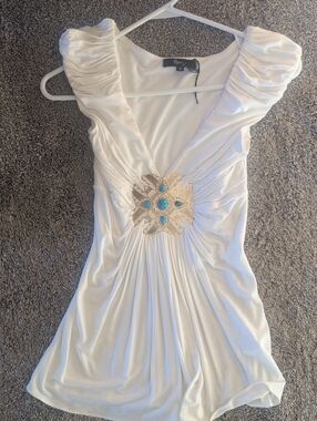 Sky White Sleeveless V-Neck Top with Turquoise and Gold Medallion